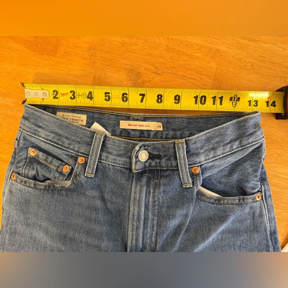 Levi's Ribcage Medium Wash Wide-Leg Raw Hem Denim Jeans - Picture 13 of 14